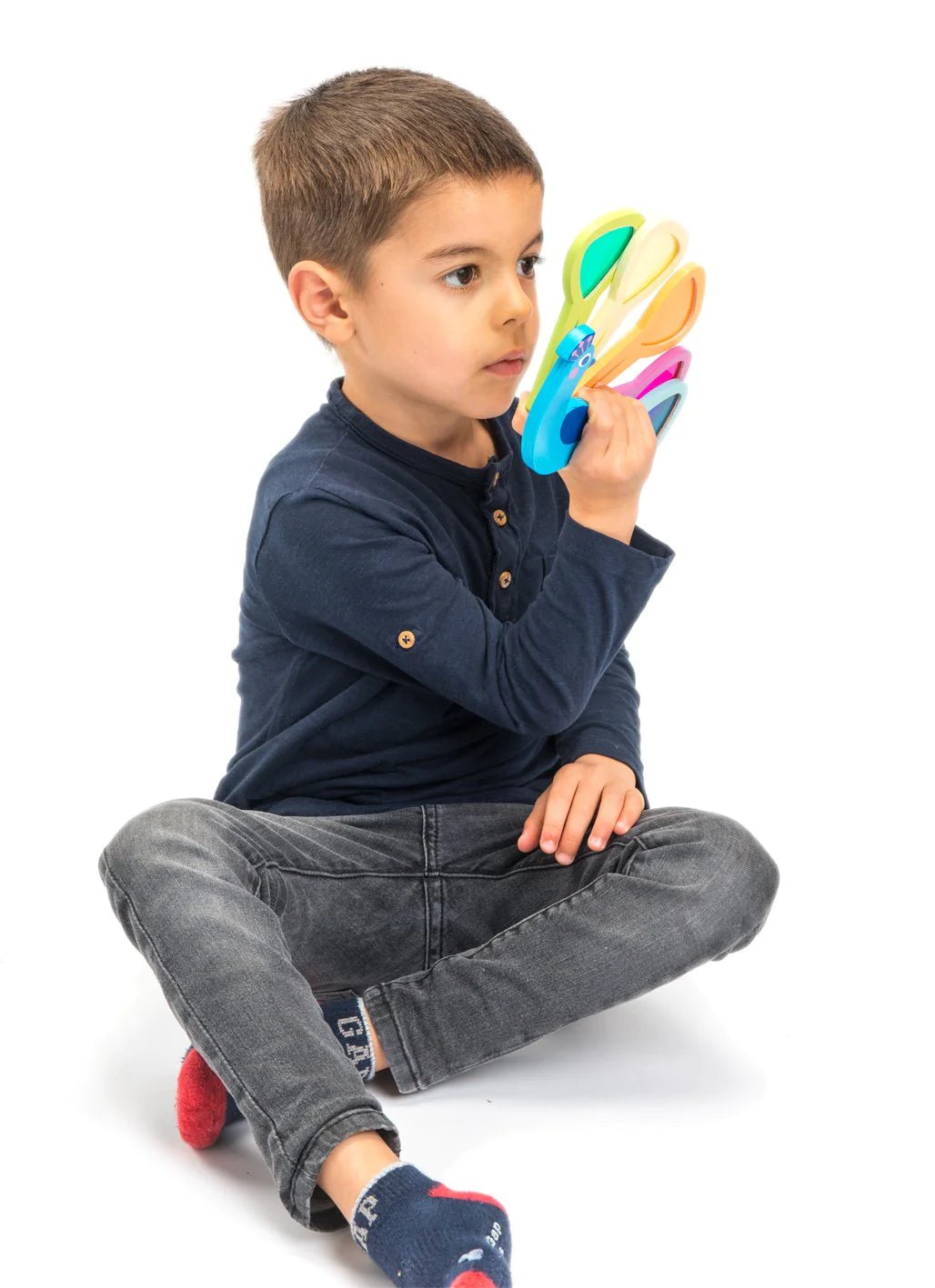 A beautiful painted wooden peacock with 5 tail feathers to see the world in different colours!