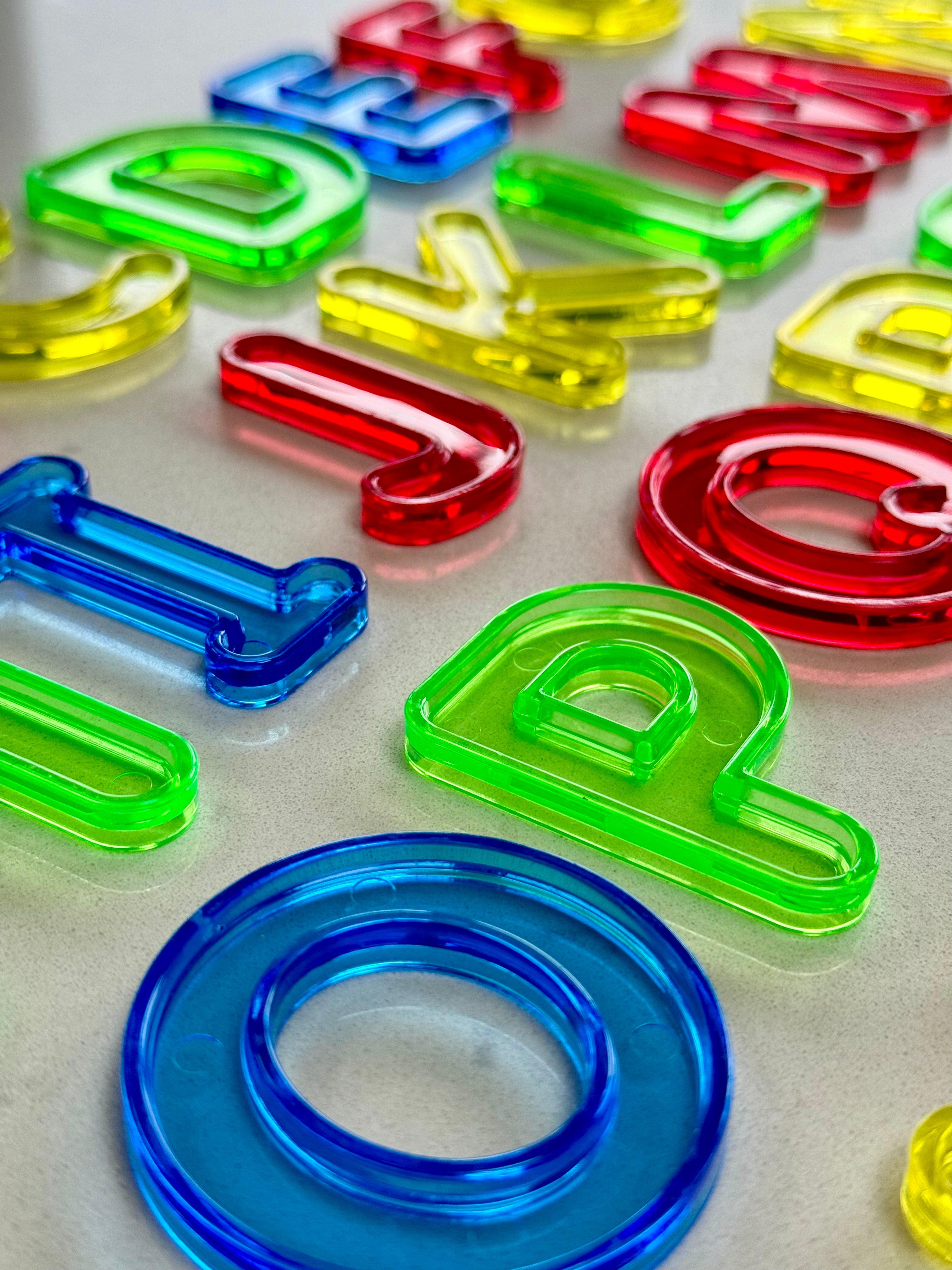 Translucent Colour Uppercase Letters – Learning and Exploring Through Play