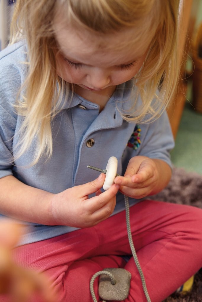 Threading Pebbles | Learning and Exploring Through Play